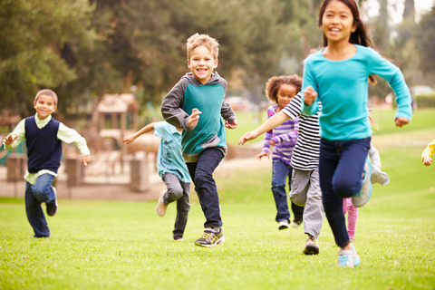 multi-ethnic children running forward